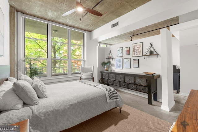 245 N Highland Ave NE Unit 220, Atlanta, GA 30307 - bedroom featuring finished concrete floors, multiple windows, and ceiling fan