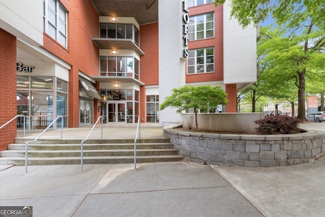 245 N Highland Ave NE Unit 220, Atlanta, GA 30307 - property entrance with brick siding