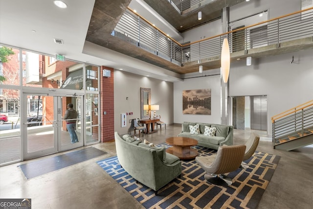 245 N Highland Ave NE Unit 220, Atlanta, GA 30307 - lobby with a high ceiling