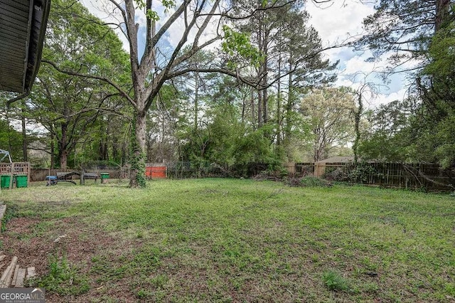 view of yard with a fenced backyard