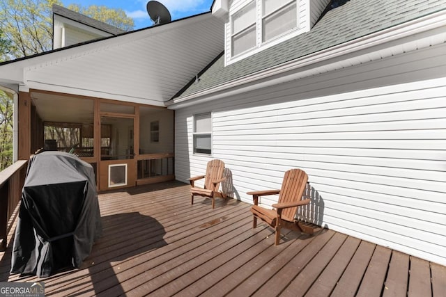 wooden deck with area for grilling