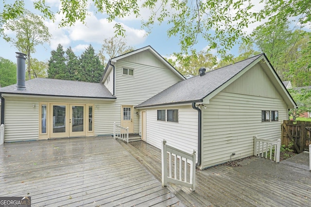 wooden deck featuring french doors