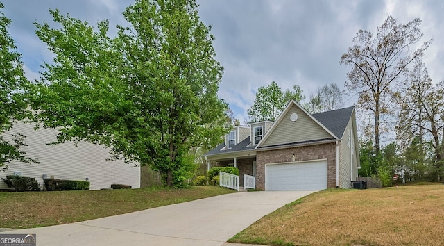 2899 Duncan Pl, Decatur, GA 30034 - view of front of home with concrete driveway, a front lawn, an attached garage, brick siding, and central AC unit