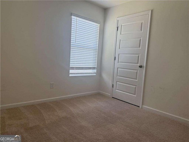 184 Grafton St, Hampton, GA 30228 - unfurnished room featuring baseboards and carpet floors