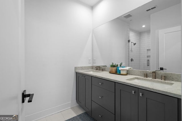 2614 Talley St, Decatur, GA 30030 - full bathroom featuring visible vents, tile patterned flooring, a stall shower, and a sink
