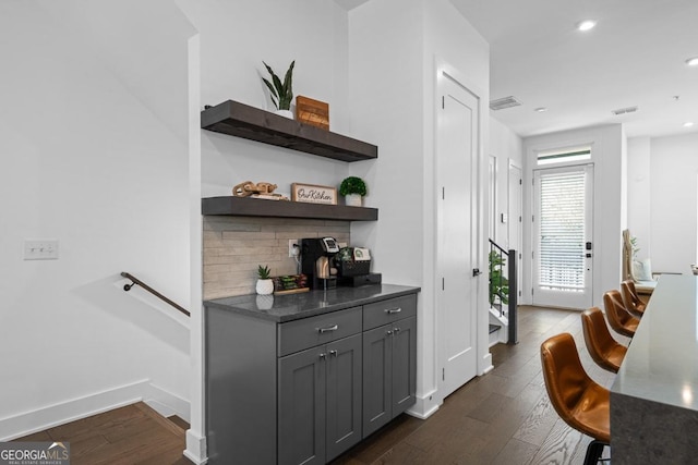 2614 Talley St, Decatur, GA 30030 - bar with decorative backsplash, visible vents, baseboards, recessed lighting, and dark wood-type flooring