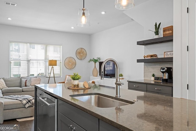 2614 Talley St, Decatur, GA 30030 - kitchen featuring dark stone countertops, recessed lighting, a sink, visible vents, and pendant lighting