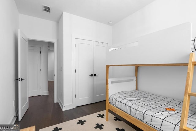 2614 Talley St, Decatur, GA 30030 - bedroom featuring visible vents, wood finished floors, and a closet