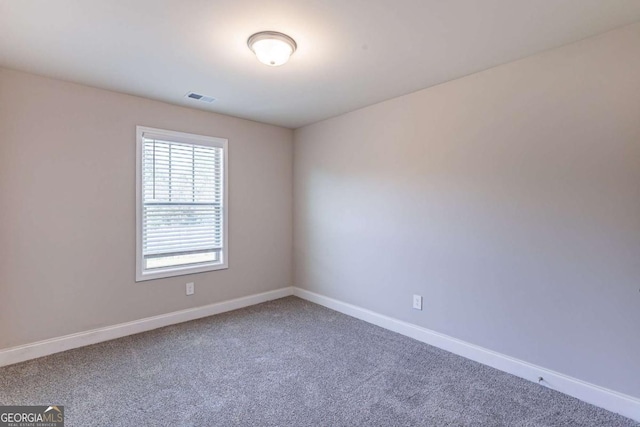 417 Flowery Branch Ct, Villa Rica, GA 30180 - carpeted empty room with visible vents and baseboards