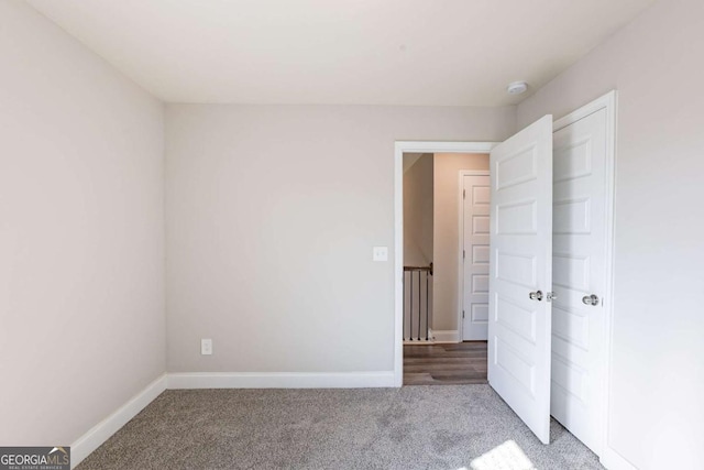 417 Flowery Branch Ct, Villa Rica, GA 30180 - unfurnished bedroom with carpet floors and baseboards