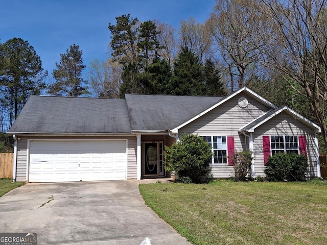 172 Willow Springs Ln, Stockbridge, GA 30281 - ranch-style home with an attached garage, concrete driveway, and a front yard
