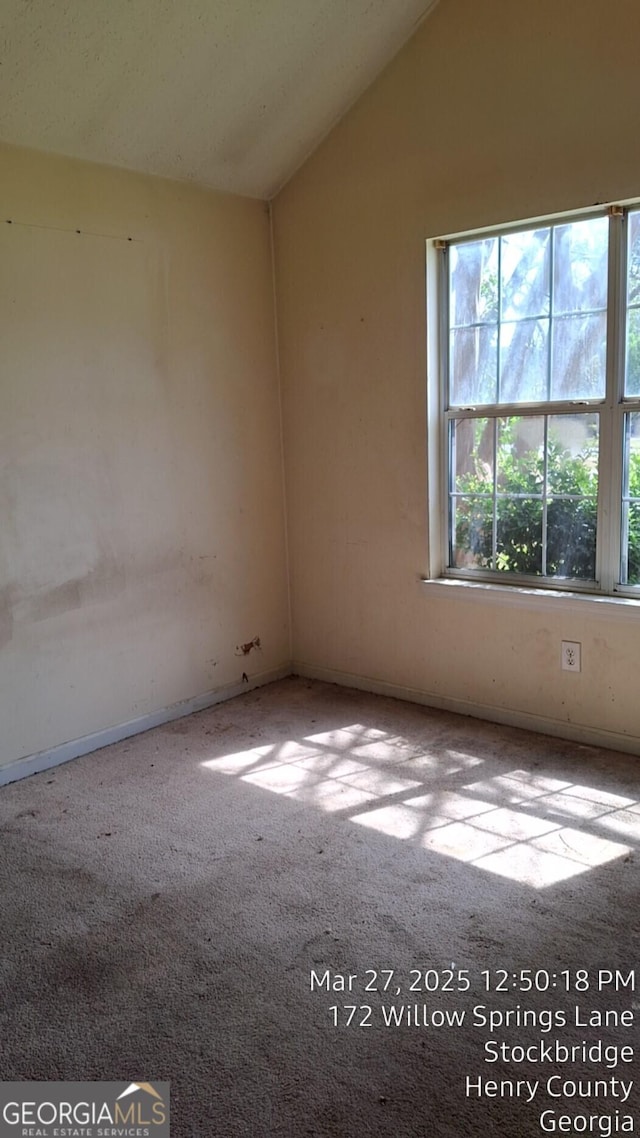 172 Willow Springs Ln, Stockbridge, GA 30281 - carpeted empty room featuring lofted ceiling