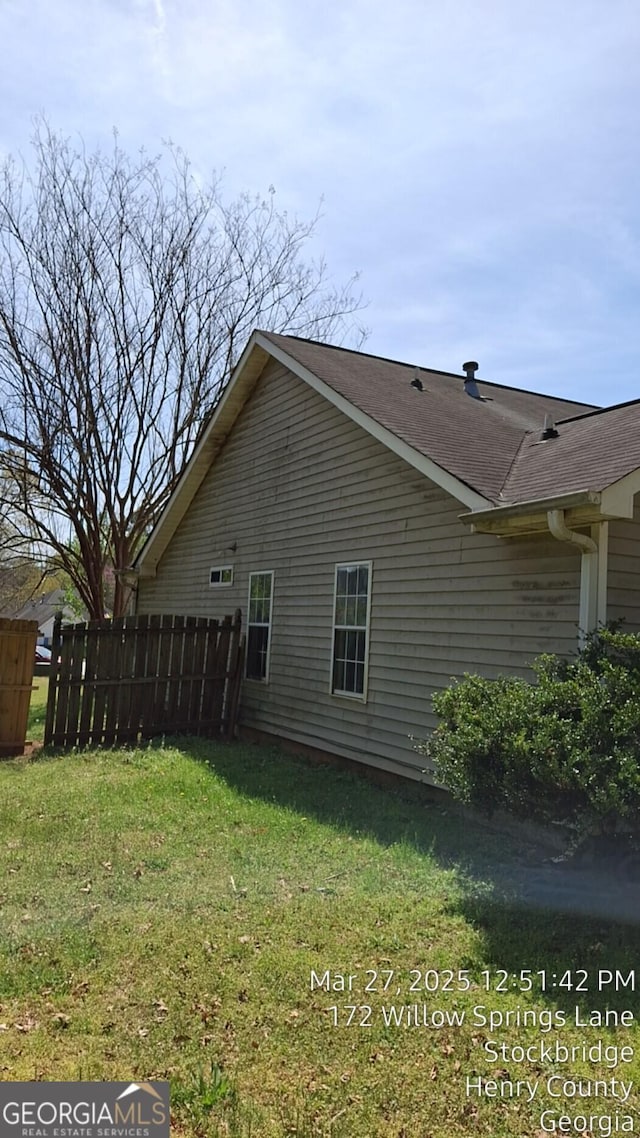 172 Willow Springs Ln, Stockbridge, GA 30281 - view of side of home featuring a shingled roof