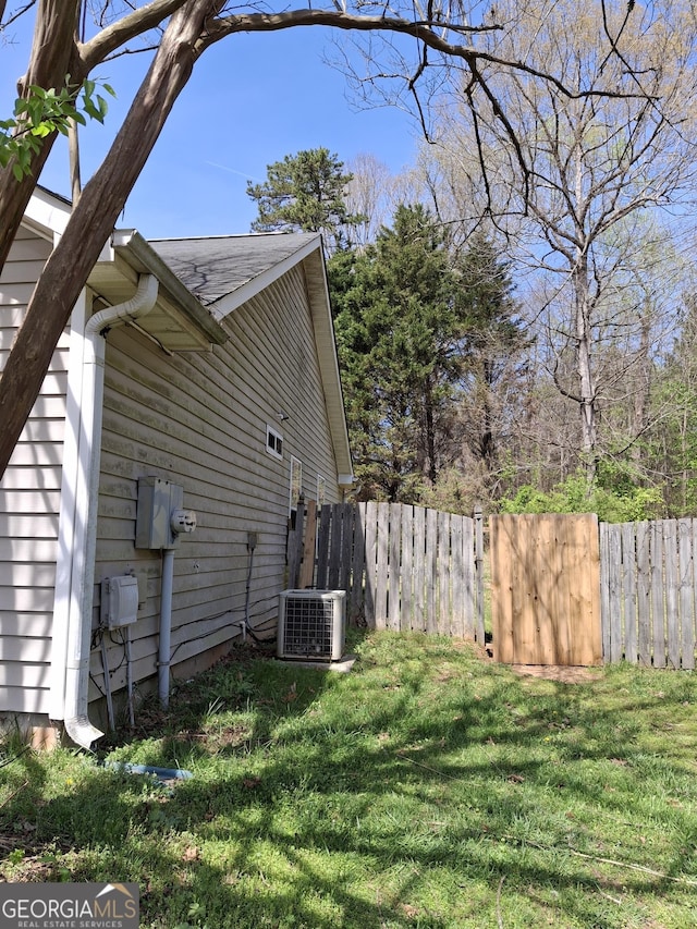 172 Willow Springs Ln, Stockbridge, GA 30281 - view of side of property with a central AC unit