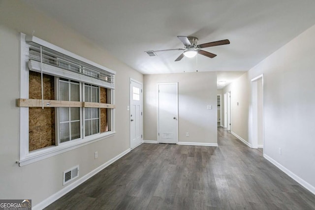 4094 E Glade Ct, Decatur, GA 30035 - empty room featuring visible vents, baseboards, a ceiling fan, and wood finished floors