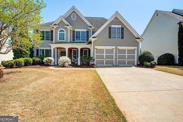 5177 Cabot Creek Dr, Buford, GA 30518 - traditional-style home featuring a garage, driveway, a front lawn, and a porch