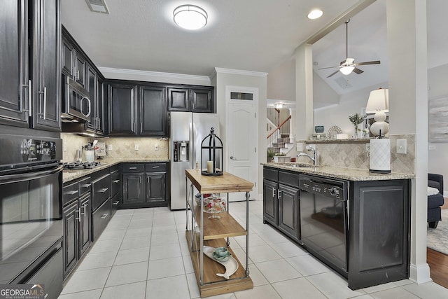 kitchen with visible vents, a sink, a ceiling fan, black appliances, and light stone counters