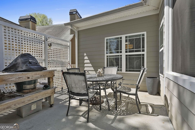 view of patio with outdoor dining area
