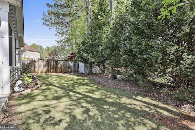 view of yard with fence