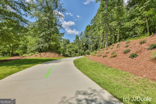 surrounding community featuring a lawn