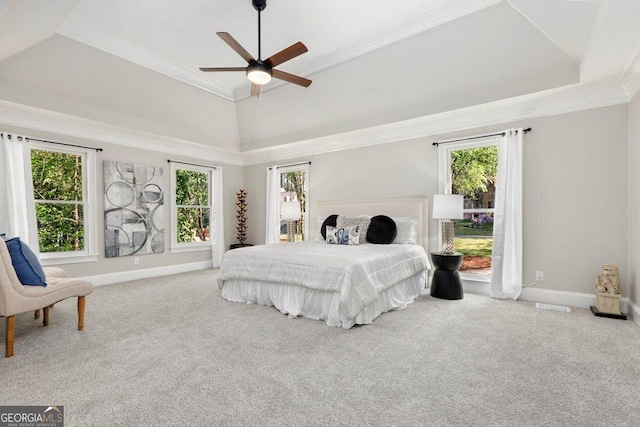 bedroom featuring carpet flooring, baseboards, multiple windows, and ornamental molding