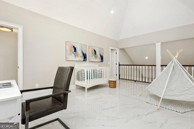 bedroom with marble finish floors, lofted ceiling, and recessed lighting