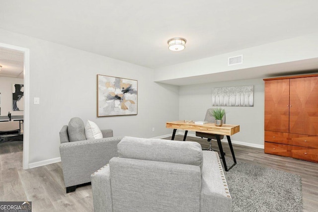 office with light wood finished floors and baseboards