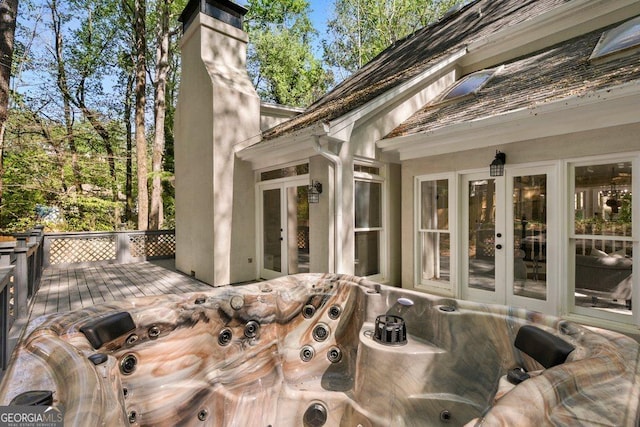 wooden deck featuring french doors