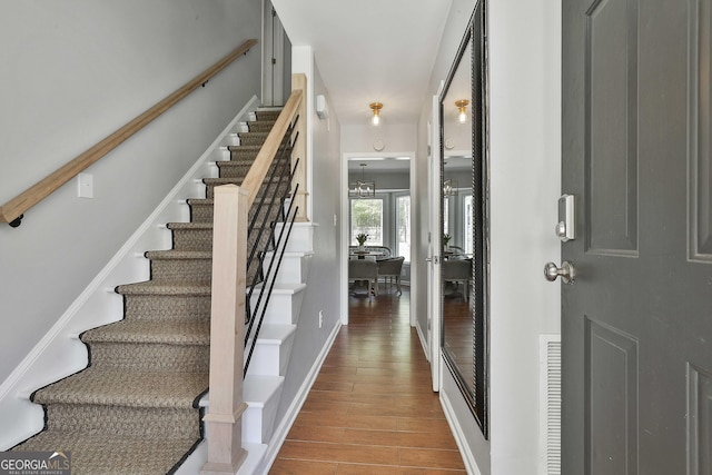 214 Windgate Ct, Peachtree City, GA 30269 - stairway with wood finished floors and french doors