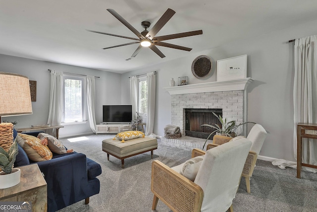 214 Windgate Ct, Peachtree City, GA 30269 - carpeted living area featuring a ceiling fan and a brick fireplace