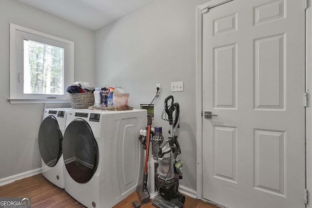 214 Windgate Ct, Peachtree City, GA 30269 - washroom with independent washer and dryer and wood finished floors