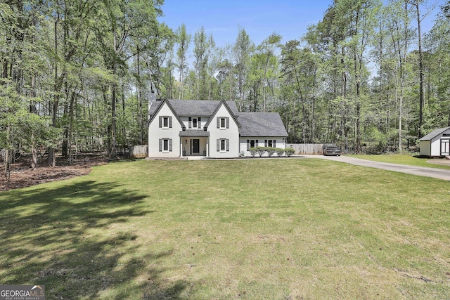 214 Windgate Ct, Peachtree City, GA 30269 - view of front of home featuring a chimney and a shingled roof