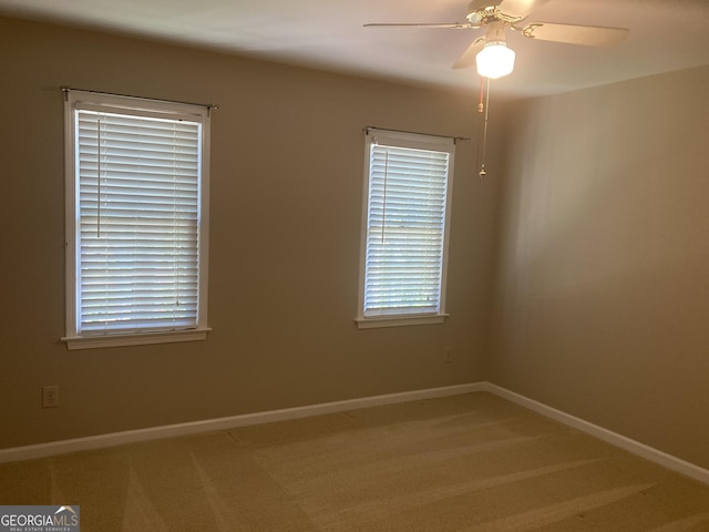 863 Fairwood Pointe NW, Acworth, GA 30101 - spare room with baseboards, light carpet, and ceiling fan