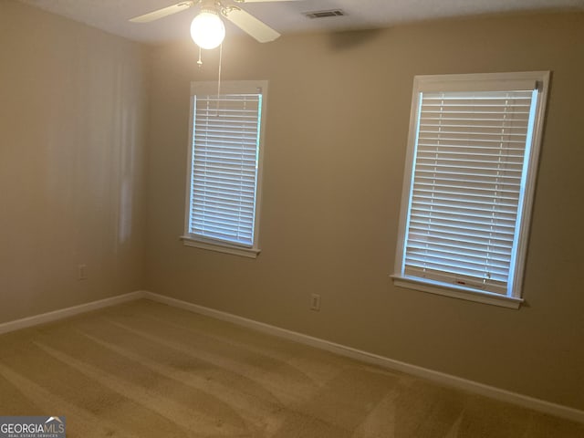 863 Fairwood Pointe NW, Acworth, GA 30101 - carpeted spare room with ceiling fan and baseboards