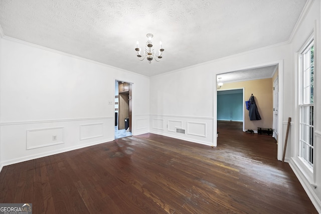985 Lake Haven Ct, Roswell, GA 30076 - unfurnished dining area with hardwood / wood-style flooring, an inviting chandelier, a decorative wall, and visible vents