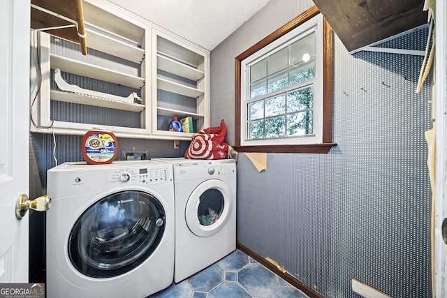 985 Lake Haven Ct, Roswell, GA 30076 - laundry room with dark tile patterned flooring, independent washer and dryer, and laundry area