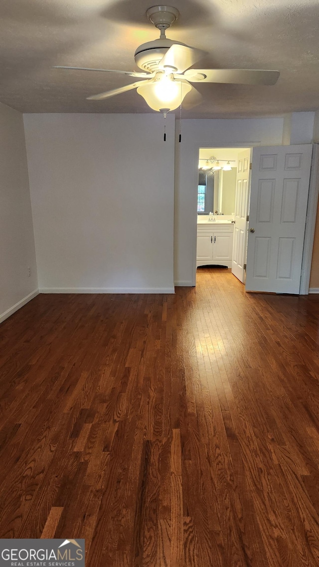 985 Lake Haven Ct, Roswell, GA 30076 - spare room with wood finished floors, a sink, baseboards, and a ceiling fan