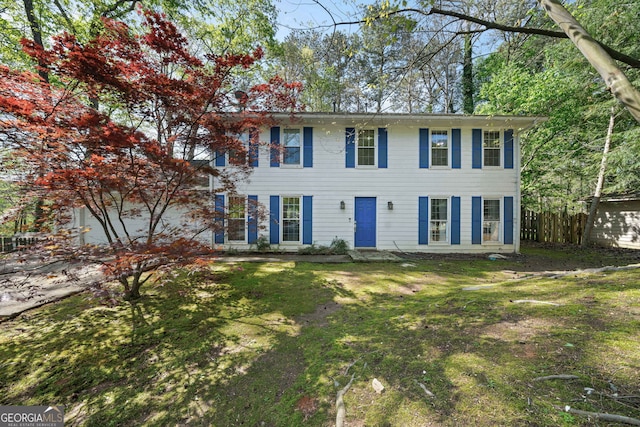 985 Lake Haven Ct, Roswell, GA 30076 - colonial home with a front yard and fence