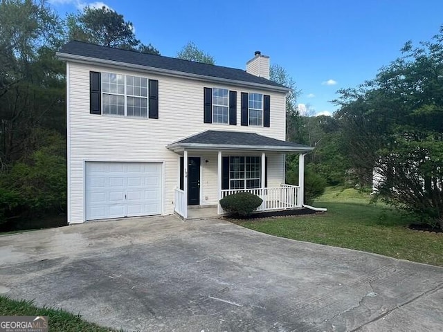 traditional-style home with concrete driveway, a front lawn, a chimney, a porch, and a garage