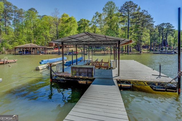 view of dock with a water view