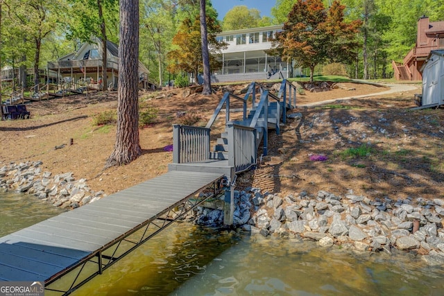 view of dock featuring stairway