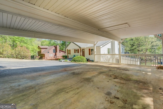 view of patio / terrace featuring a carport