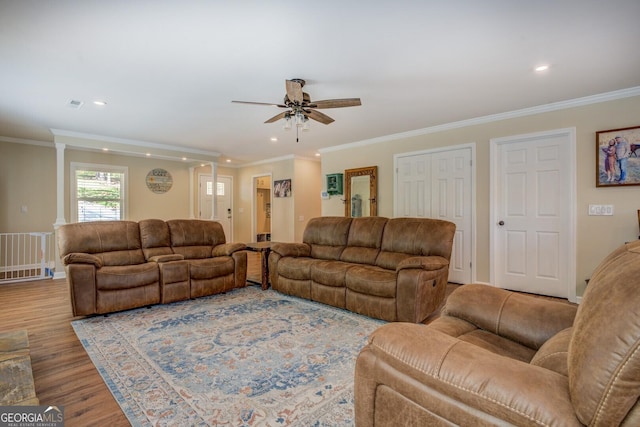 living room featuring ornamental molding, a ceiling fan, wood finished floors, and recessed lighting