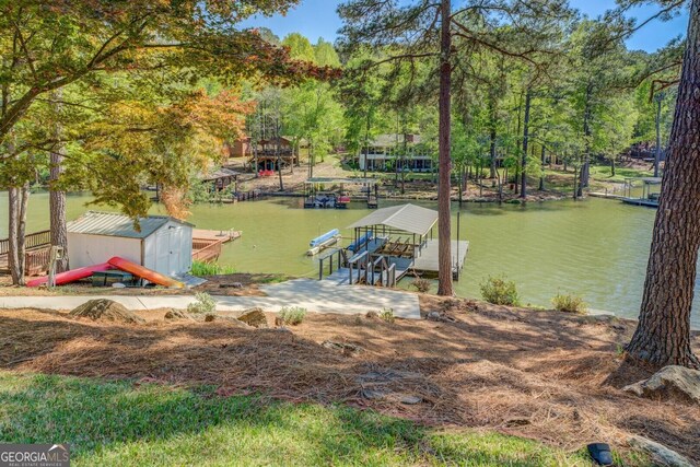 dock area with a water view