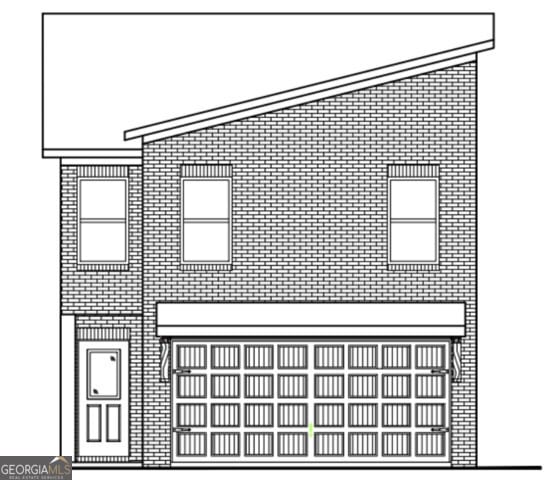 traditional-style home featuring a garage, fence, and concrete driveway