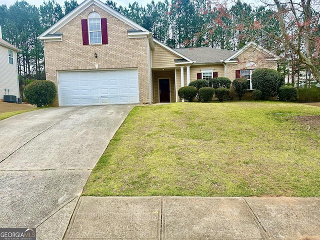 4254 Wood Cove Dr, Snellville, GA 30039 - view of front of property with a front yard, an attached garage, cooling unit, brick siding, and driveway