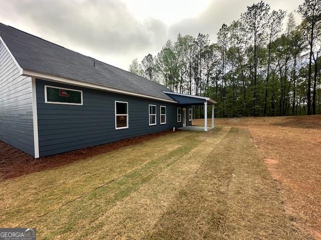 302 Lakeside Dr Lot 74, Lagrange, GA 30240 - view of side of property with a lawn