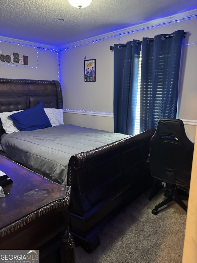 carpeted bedroom with a textured ceiling