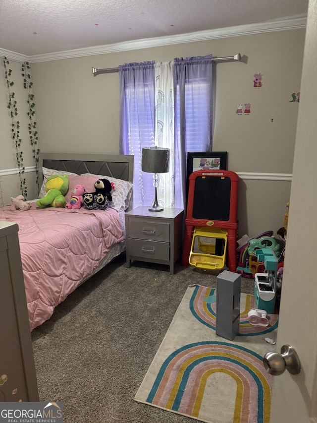 carpeted bedroom with a textured ceiling and crown molding