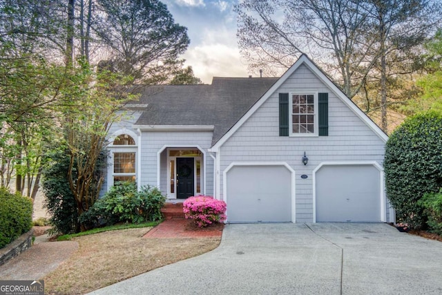 3711 Spinnaker Cir, Alpharetta, GA 30005 - view of front of house with concrete driveway, a garage, and roof with shingles